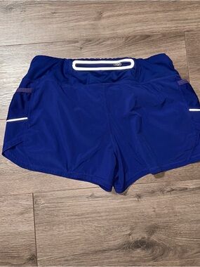 Athleta Deep Blue Athletic Shorts with Reflective Trim